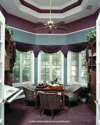 The study has detailed ceilings and large windows