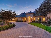 Verano House Plan driveway view at dusk