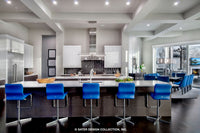 Waters Edge House Plan&#39;s large kitchen island bar