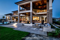 Waters Edge House Plan&#39;s outdoor kitchen and firepit 